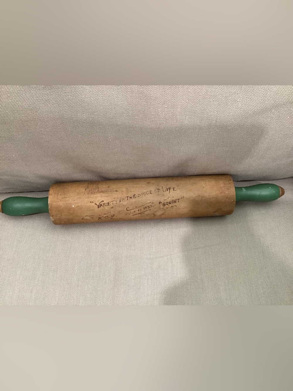 Antique Munising Wooden rolling pin with distinct green handles